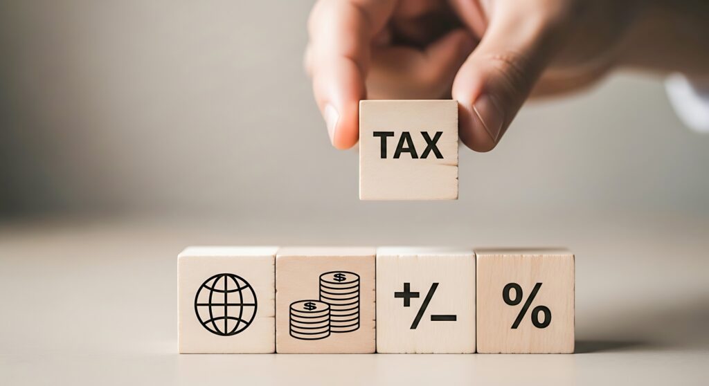 木製ブロックを使った税金（TAX）のコンセプトイメージ